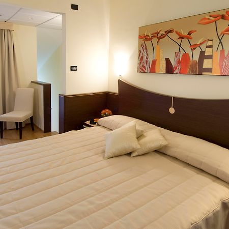 As Hotel Cambiago Rum bild
