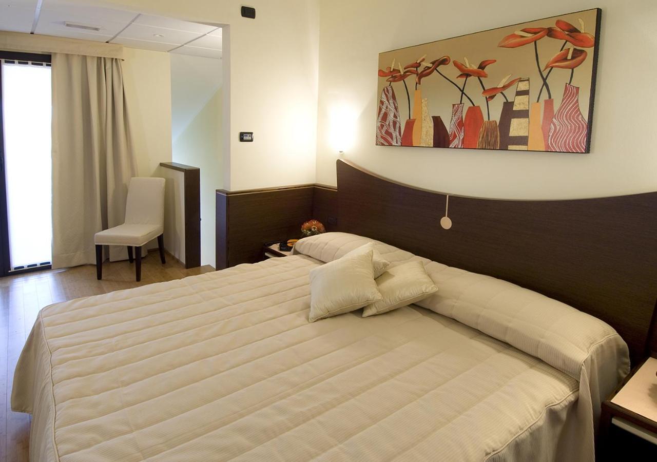 As Hotel Cambiago Rum bild